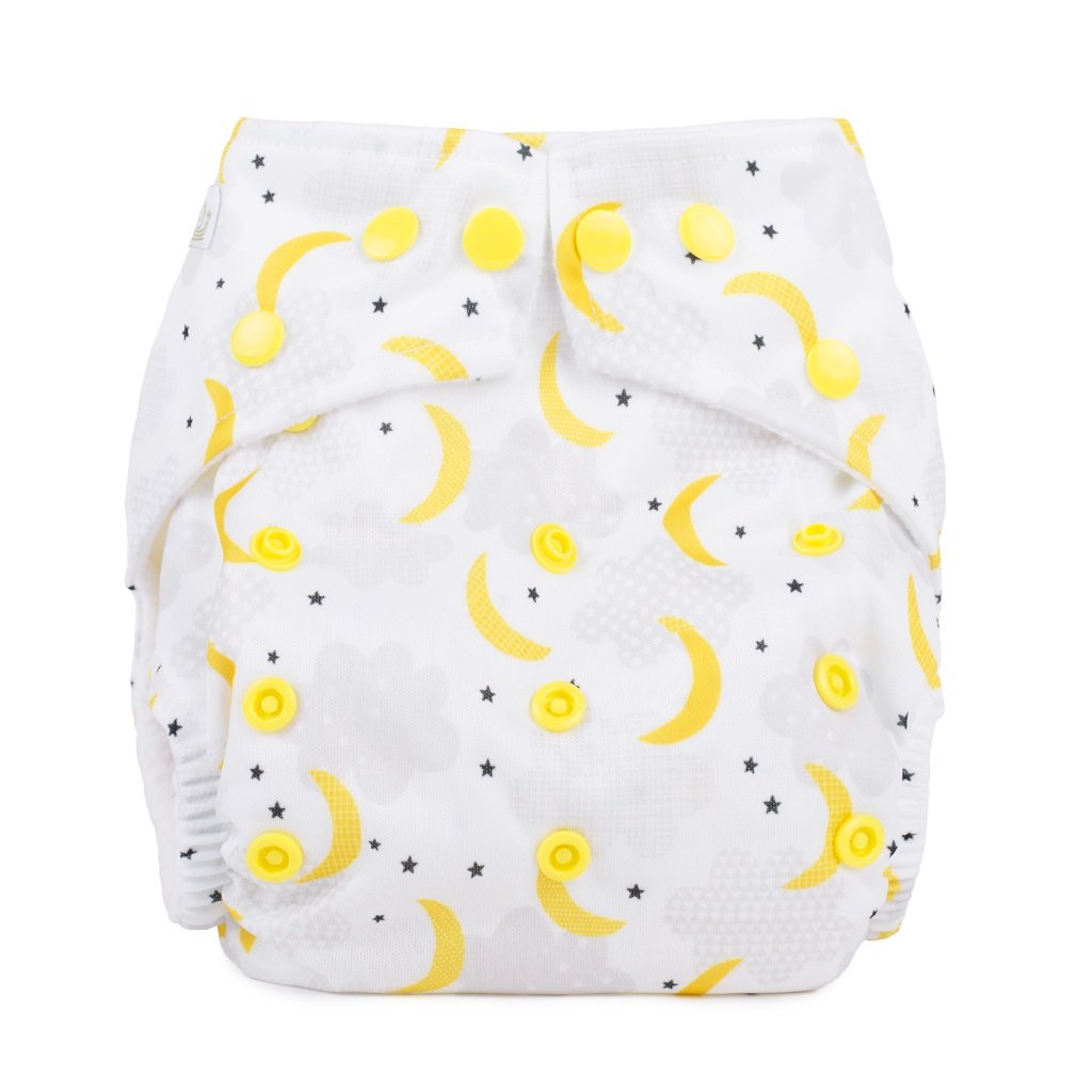White reusable nappy with yellow crescent moons and black stars