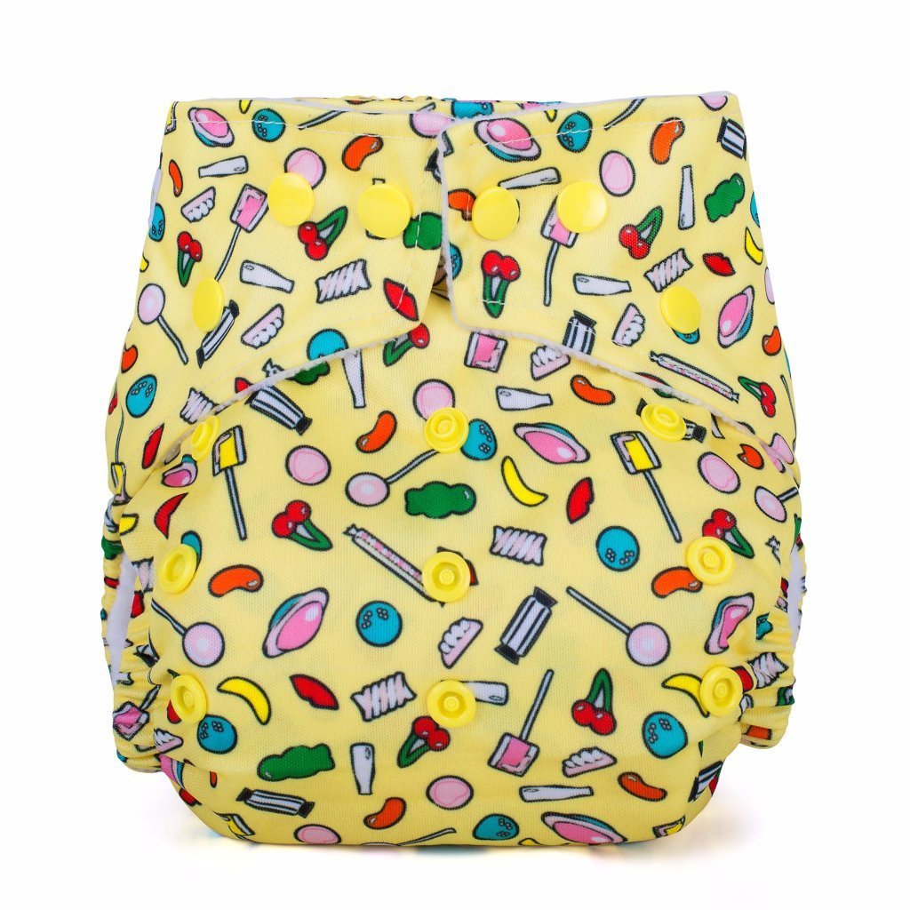 Yellow cloth nappy with bright retro sweets design